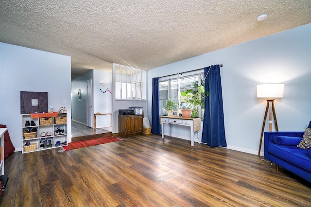 200 Autumn Rd, Madera, CA 93637 - unfurnished living room featuring wood finished floors and a textured ceiling