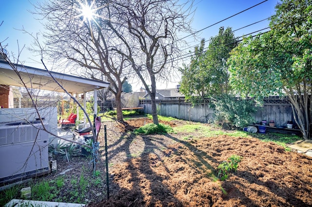 200 Autumn Rd, Madera, CA 93637 - fenced backyard featuring central AC unit