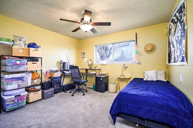 200 Autumn Rd, Madera, CA 93637 - bedroom with carpet floors, a textured ceiling, a desk, and a ceiling fan