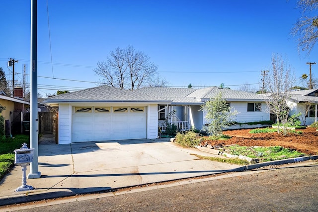 200 Autumn Rd, Madera, CA 93637 - ranch-style home with driveway, an attached garage, and roof with shingles