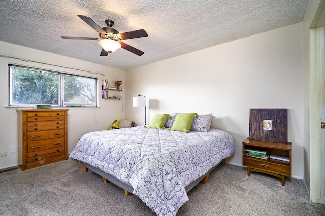 200 Autumn Rd, Madera, CA 93637 - carpeted bedroom with a textured ceiling and a ceiling fan