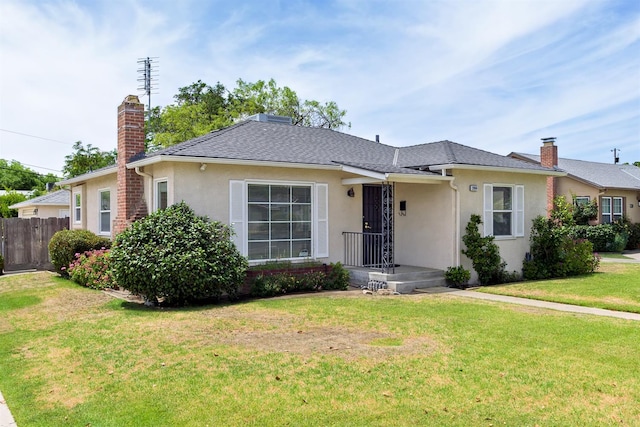 2994 E Cornell Ave, Fresno, CA 93703 - view of front facade featuring stucco siding and a chimney
