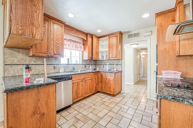 7820 N Fancher Rd, Clovis, CA 93619 - kitchen with stainless steel dishwasher, a sink, decorative backsplash, brown cabinets, and recessed lighting