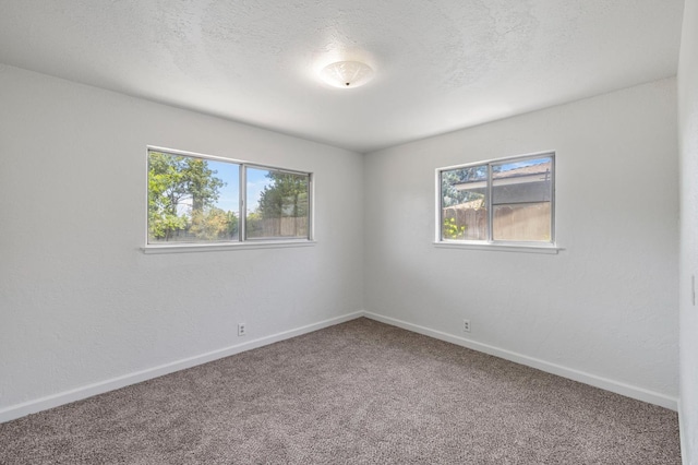 4824 E Brown Ave, Fresno, CA 93703 - spare room with carpet flooring and baseboards