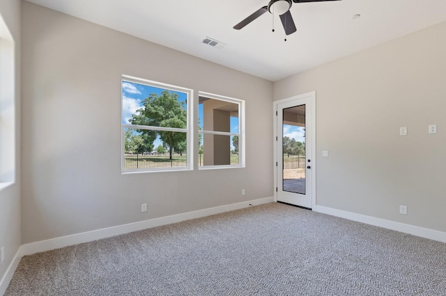 8440 Lake Shore Dr, Chowchilla, CA 93610 - empty room with light colored carpet, a ceiling fan, and baseboards