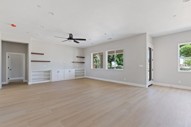 8440 Lake Shore Dr, Chowchilla, CA 93610 - unfurnished living room featuring ceiling fan, light wood-type flooring, baseboards, and recessed lighting