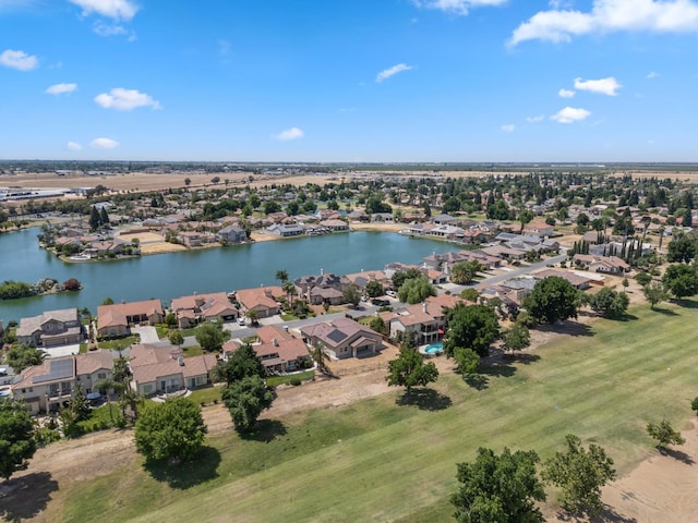 8440 Lake Shore Dr, Chowchilla, CA 93610 - aerial perspective of suburban area with a large body of water
