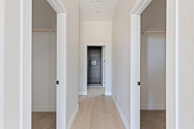 8440 Lake Shore Dr, Chowchilla, CA 93610 - corridor featuring baseboards and wood finished floors