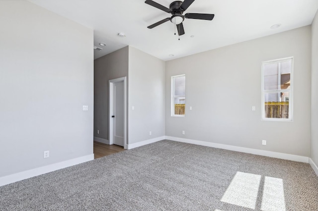 8385 Lake Shore Dr, Chowchilla, CA 93610 - spare room with carpet floors, baseboards, and a ceiling fan