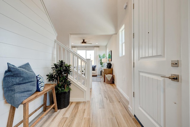 1151 Maclure Ave W, Madera, CA 93636 - foyer with stairway, light wood finished floors, baseboards, and ceiling fan