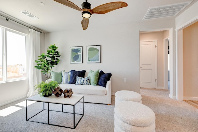1151 Maclure Ave W, Madera, CA 93636 - carpeted living room featuring ceiling fan and baseboards