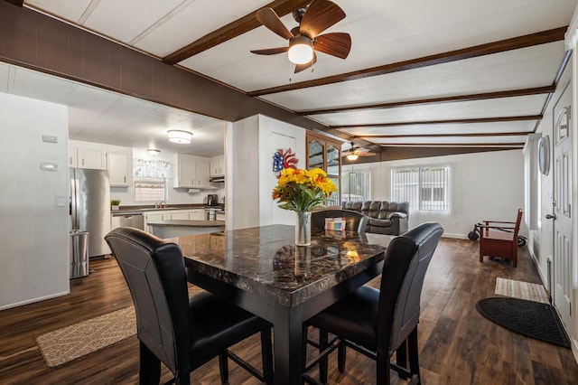 2627 W Midvalley, Visalia, CA 93277 - dining space featuring ceiling fan, beam ceiling, dark wood-type flooring, and baseboards