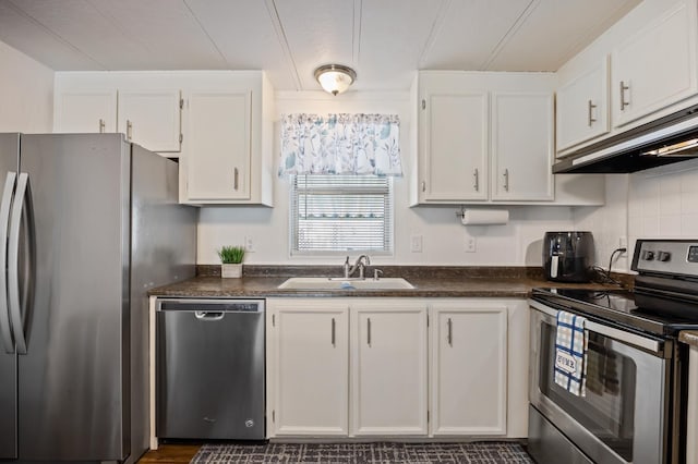 2627 W Midvalley, Visalia, CA 93277 - kitchen with stainless steel appliances, a sink, dark countertops, and white cabinetry