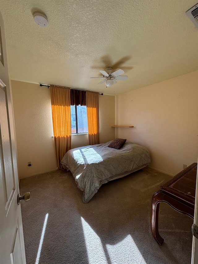 32633 Rd 222, North Fork, CA 93643 - carpeted bedroom featuring a textured ceiling and ceiling fan