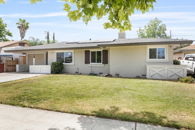 958 E Cornell Ave, Fresno, CA 93704 - ranch-style house with solar panels, stucco siding, a gate, and a shingled roof