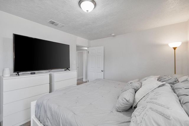 958 E Cornell Ave, Fresno, CA 93704 - bedroom with a textured ceiling
