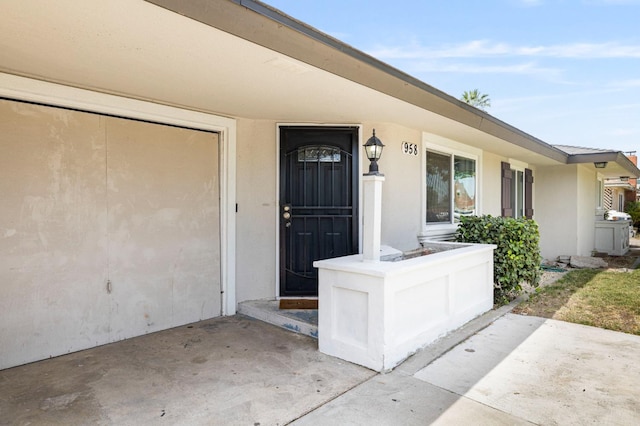 958 E Cornell Ave, Fresno, CA 93704 - property entrance with stucco siding and a porch