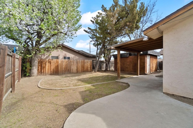 702 W Cortner Ave, Hanford, CA 93230 - fenced backyard featuring a patio