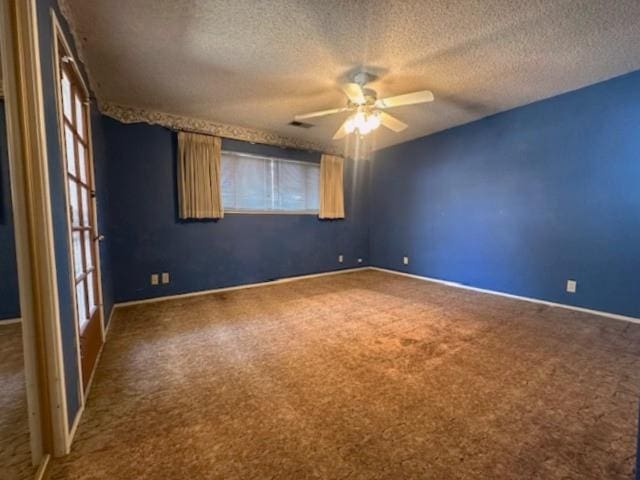 702 W Cortner Ave, Hanford, CA 93230 - carpeted spare room featuring ceiling fan, a textured ceiling, and baseboards