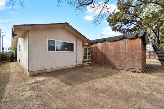 702 W Cortner Ave, Hanford, CA 93230 - back of property with stucco siding