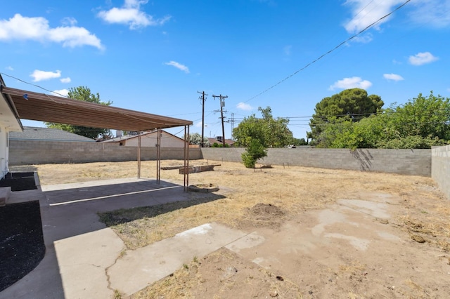 4641 E Weldon Ave, Fresno, CA 93703 - fenced backyard featuring a patio area