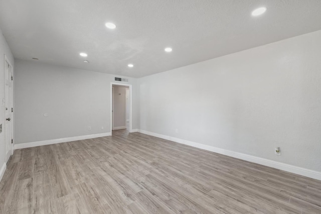4641 E Weldon Ave, Fresno, CA 93703 - unfurnished room featuring recessed lighting, light wood-style flooring, and baseboards