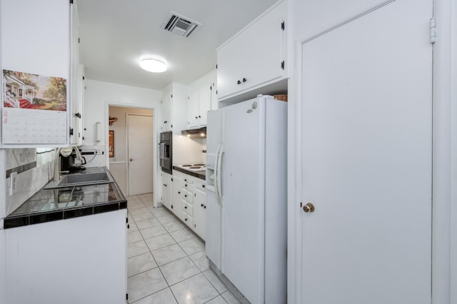 3979 N Pleasant Ave, Fresno, CA 93705 - kitchen with white appliances, a sink, white cabinetry, backsplash, and light tile patterned floors
