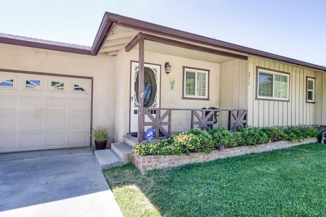 3979 N Pleasant Ave, Fresno, CA 93705 - view of front of house with board and batten siding, an attached garage, driveway, and a front yard