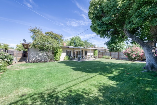3979 N Pleasant Ave, Fresno, CA 93705 - view of yard with a patio