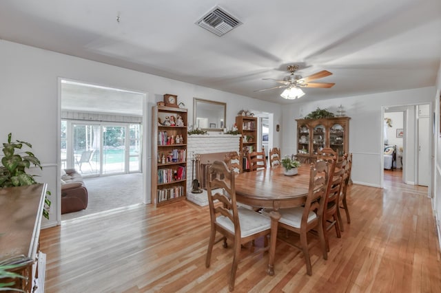3979 N Pleasant Ave, Fresno, CA 93705 - dining room featuring a ceiling fan and light wood-style floors