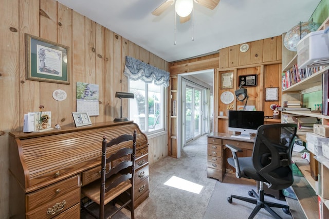 3979 N Pleasant Ave, Fresno, CA 93705 - home office featuring wood walls, carpet flooring, and a ceiling fan