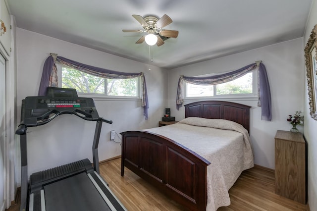 3979 N Pleasant Ave, Fresno, CA 93705 - bedroom with light wood-type flooring, ceiling fan, and baseboards