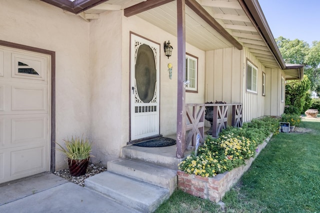 3979 N Pleasant Ave, Fresno, CA 93705 - entrance to property with board and batten siding, stucco siding, and a yard