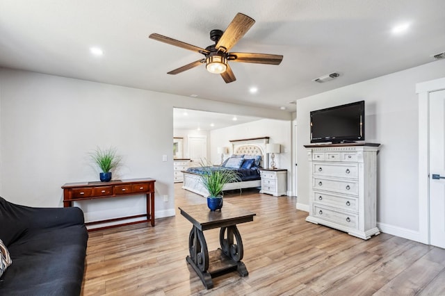 4341 W Dakota Ave, Fresno, CA 93722 - living room featuring a ceiling fan, light wood-type flooring, recessed lighting, and baseboards