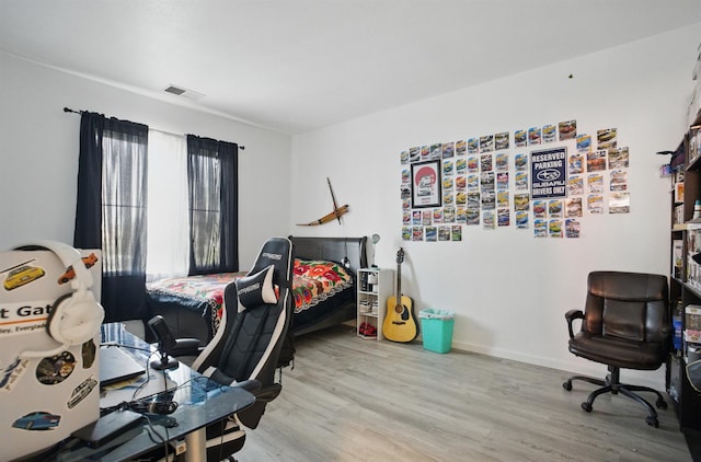 1216 Avignon Dr, Merced, CA 95348 - bedroom featuring wood finished floors and baseboards