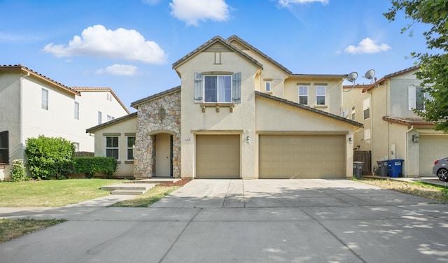 1216 Avignon Dr, Merced, CA 95348 - view of front of house with a garage, stucco siding, concrete driveway, and stone siding