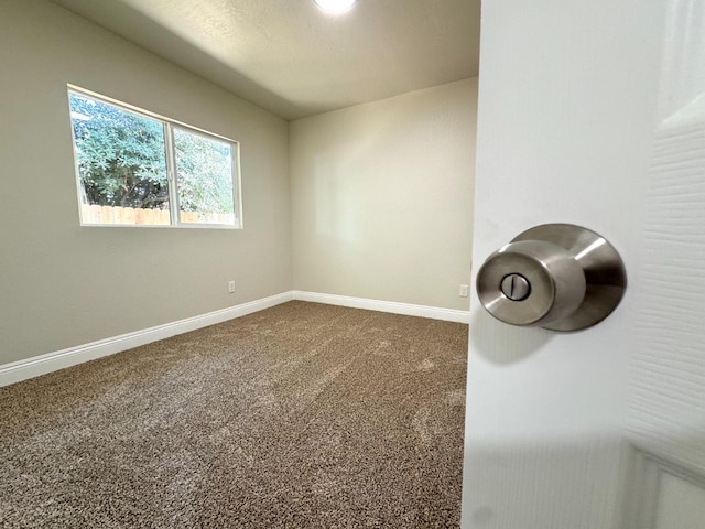 4221 E Grant Ave, Fresno, CA 93702 - empty room featuring baseboards and carpet flooring