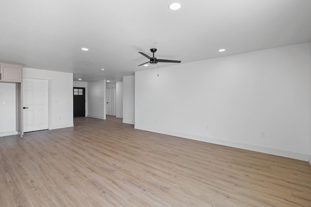 25900 Tanforan Dr, Madera, CA 93638 - unfurnished living room featuring recessed lighting, a ceiling fan, light wood-type flooring, and baseboards