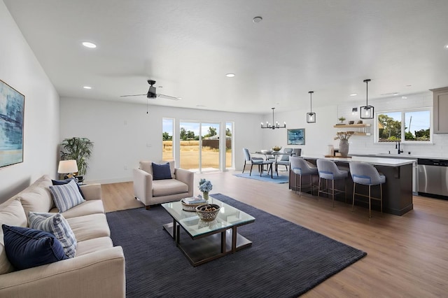 25900 Tanforan Dr, Madera, CA 93638 - living area with light wood-style flooring, a ceiling fan, and recessed lighting