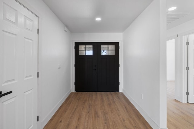 25900 Tanforan Dr, Madera, CA 93638 - foyer with wood finished floors, baseboards, and recessed lighting