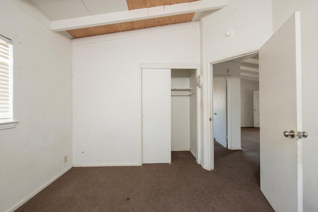 2108 E Sussex Way, Fresno, CA 93726 - unfurnished bedroom with dark carpet, multiple windows, and a closet