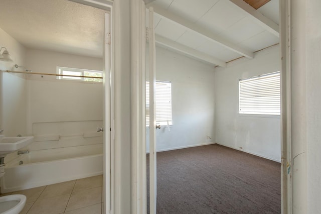 2108 E Sussex Way, Fresno, CA 93726 - bathroom with tub / shower combination, toilet, and tile patterned floors