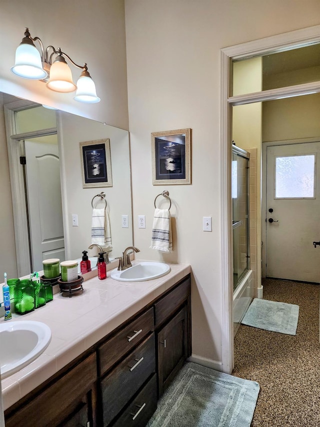 2513 Twain Ave, Clovis, CA 93611 - full bath with double vanity and shower / bath combination with glass door