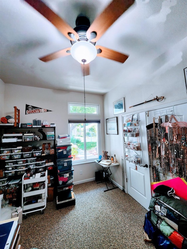 2513 Twain Ave, Clovis, CA 93611 - misc room with ceiling fan, baseboards, and carpet