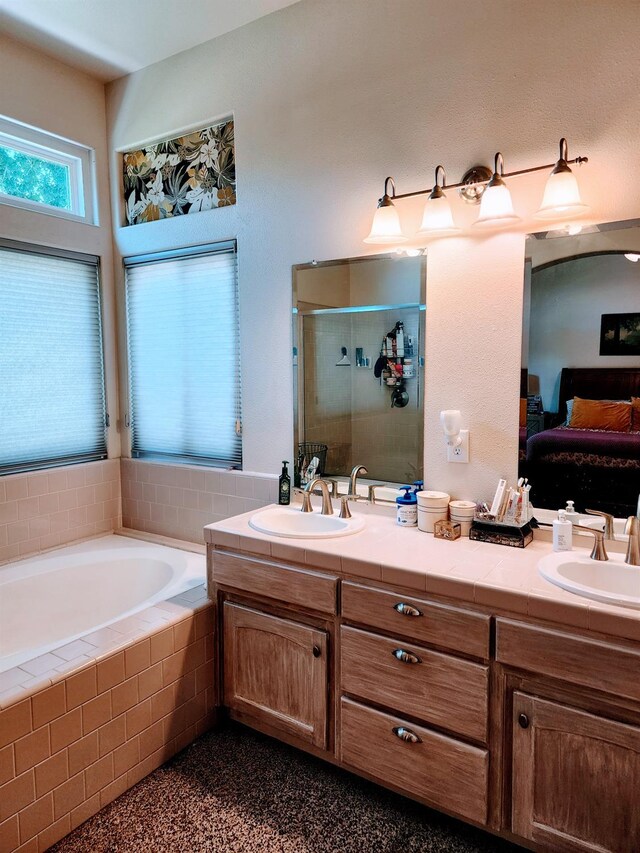2513 Twain Ave, Clovis, CA 93611 - full bathroom featuring ensuite bath, a shower stall, double vanity, and a garden tub