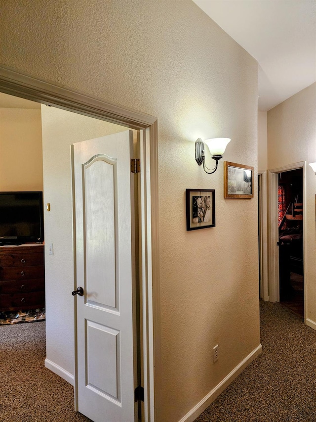 2513 Twain Ave, Clovis, CA 93611 - hallway with carpet floors and baseboards
