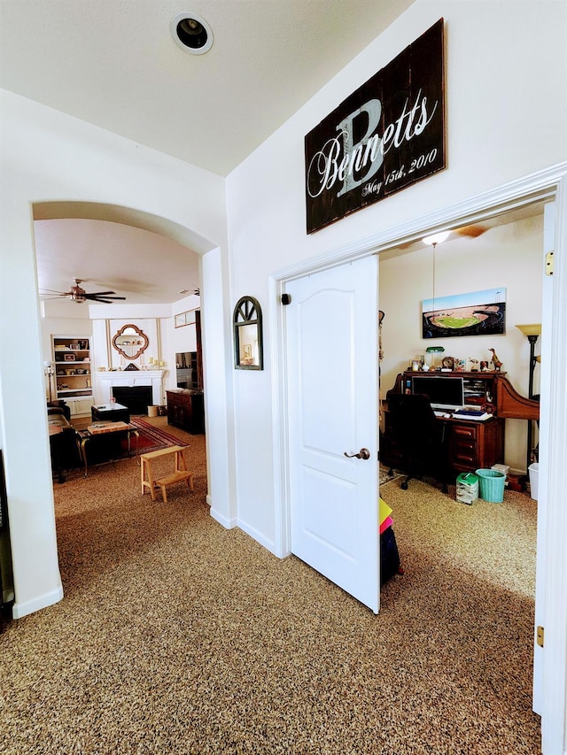 2513 Twain Ave, Clovis, CA 93611 - hall featuring arched walkways, speckled floor, and baseboards
