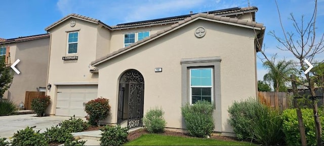 981 Marengo Ave, Clovis, CA 93619 - view of front of property featuring an attached garage, stucco siding, and concrete driveway