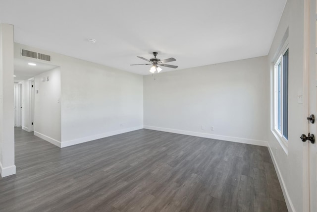 513 Waldo, Exeter, CA 93221 - unfurnished room with a ceiling fan, baseboards, and dark wood-style flooring