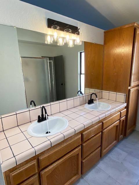 485 E Alluvial Ave Unit 102, Fresno, CA 93720 - full bathroom with double vanity